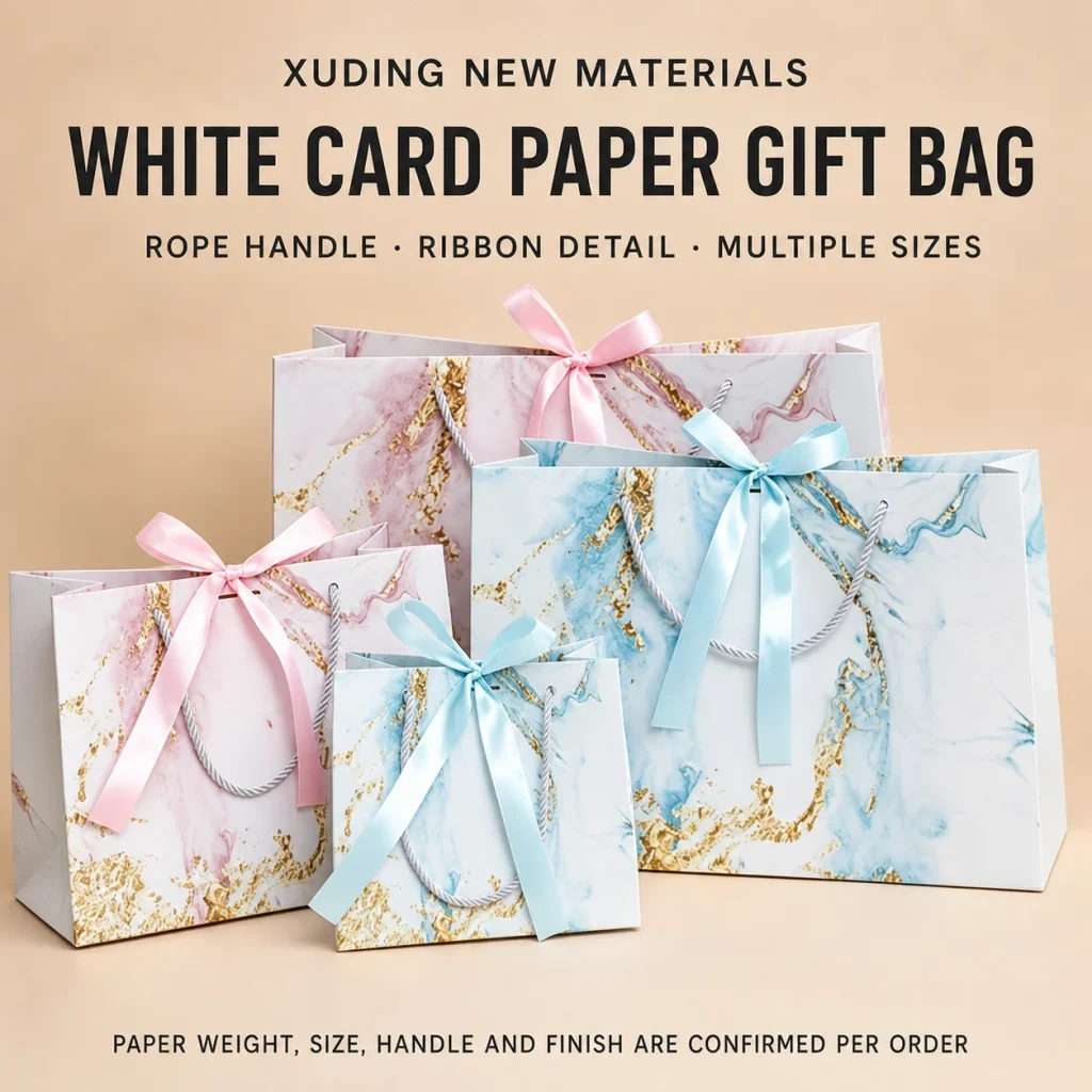 White card paper gift bags with rope handles and ribbons